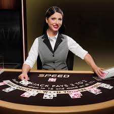 Mobile phone showing bumi303 login app with Liga 1 fixtures and live-dealer table lobby